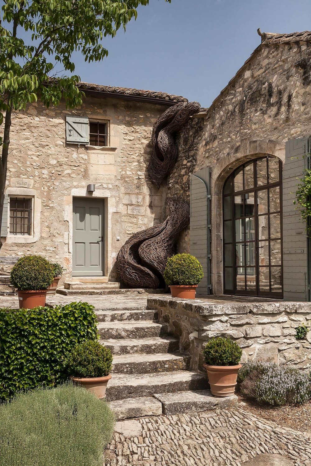 david price design farmhouse alpilles exterior stone steps sculpture